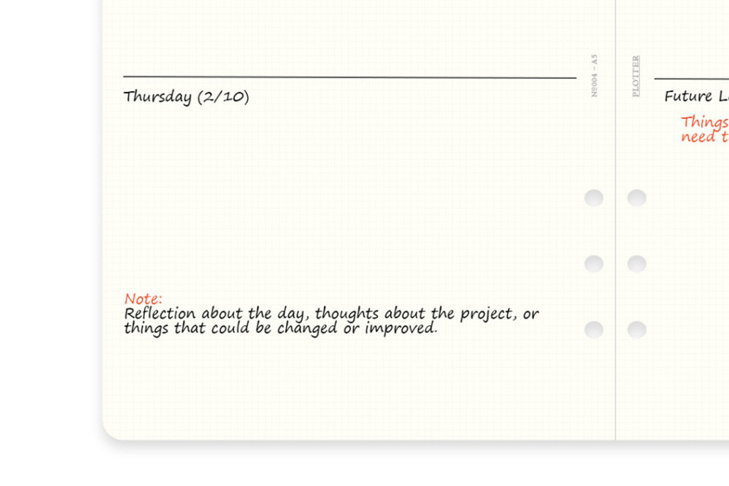 Close-up of A5 Size 2 mm grid refills with sample calendar spread.