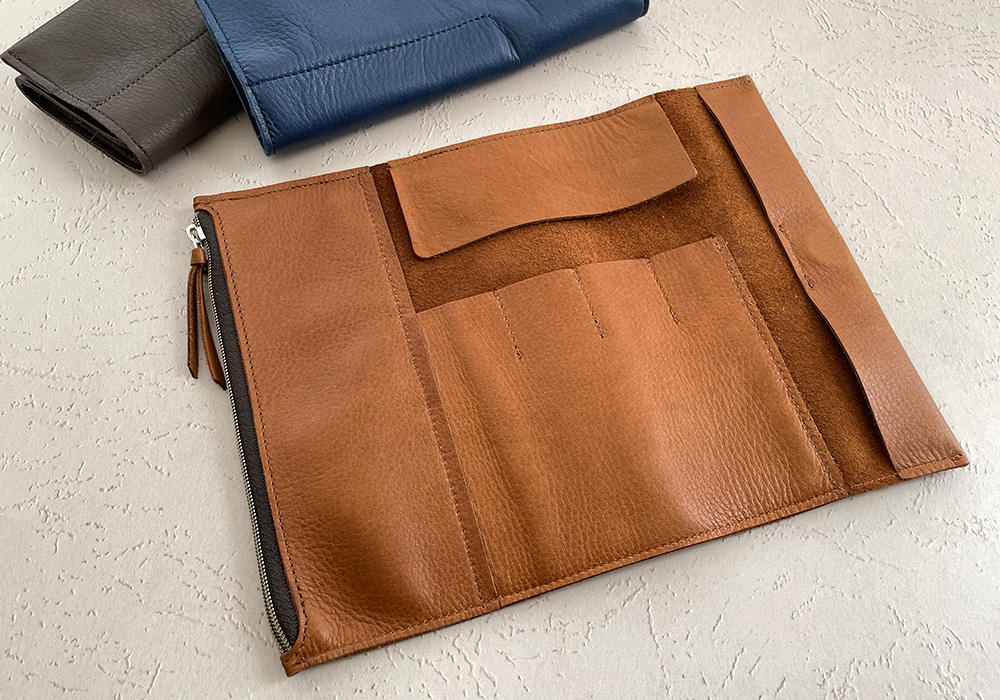 A PLOTTER roll pen case spread out.