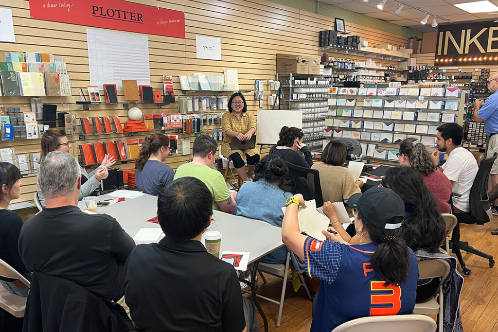 A group of customers sitting in the seminar hosted by PLOTTER USA staff.
