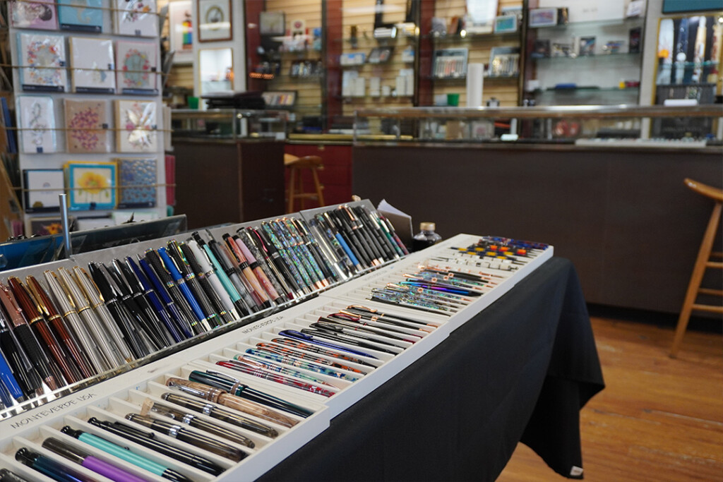 A table filled with boxes of fountain pens inside the Dromgoole's store.