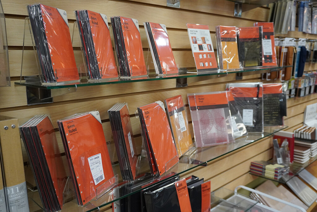 A wall display featuring all the Refill Memo Pad types from PLOTTER.