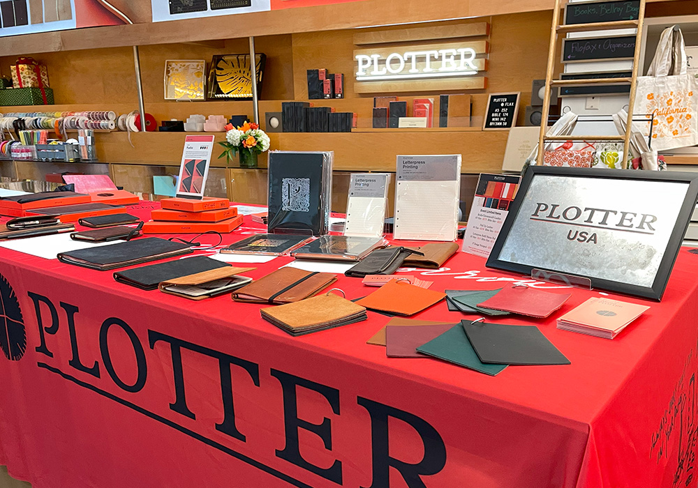 A table inside FLAX Pen to Paper displaying a variety of leather samples.