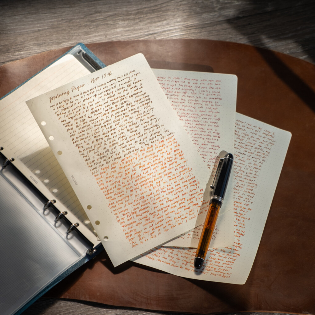 Light filtering through on several pages of filled Refill Memo Pad pages.