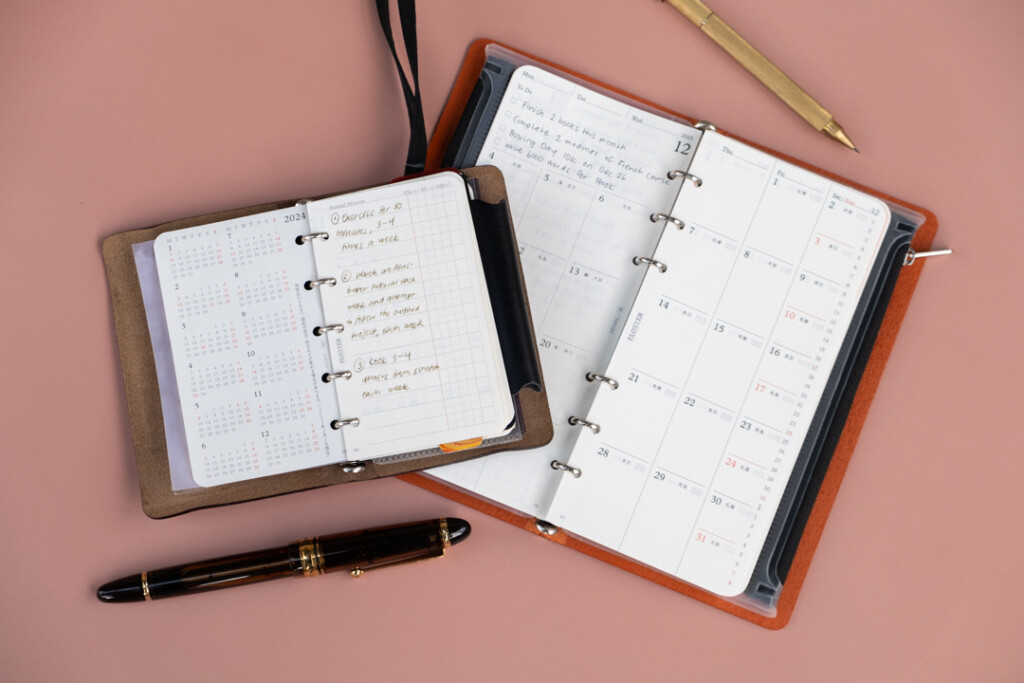 A PLOTTER Diary Refill in Mini 5 Size next to a PLOTTER Diary Refill in Narrow Size. 