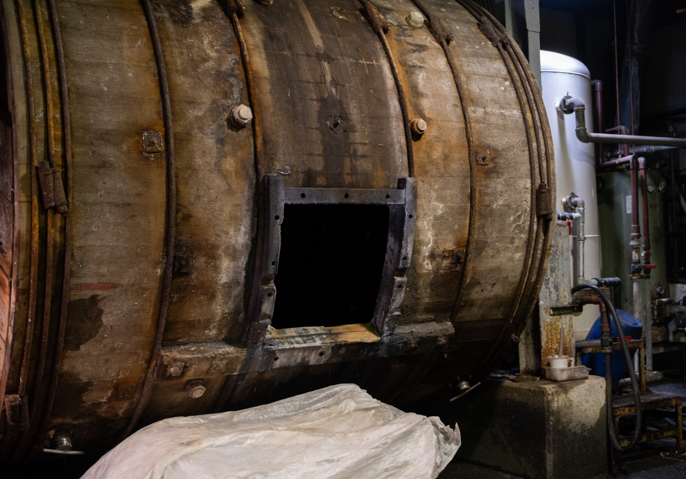 Close-up of wooden barrel used for leather tanning and dyeing.