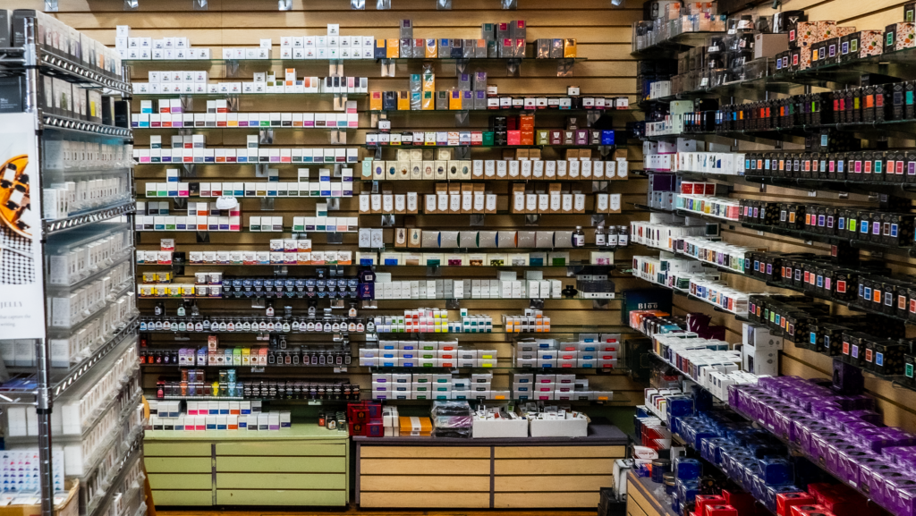 A wall inside Dromgoole's filled with shelves of inks.