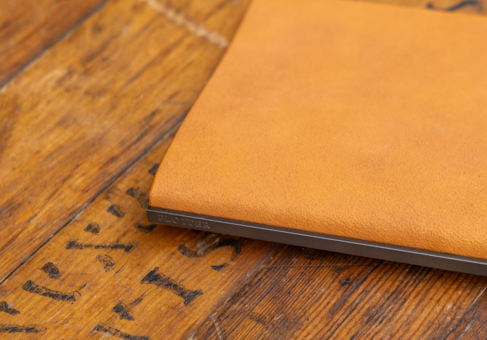 Horween Glove leather in yellow paired with a matte black backplate.
