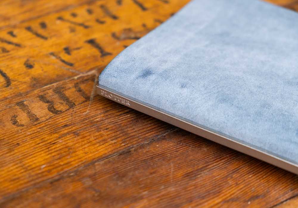 Shiranami leather binder paired with a silver backplate.