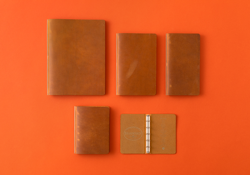 PLOTTER x Horween leather collaboration Predator Leather in Original Color Amber in five sizes.