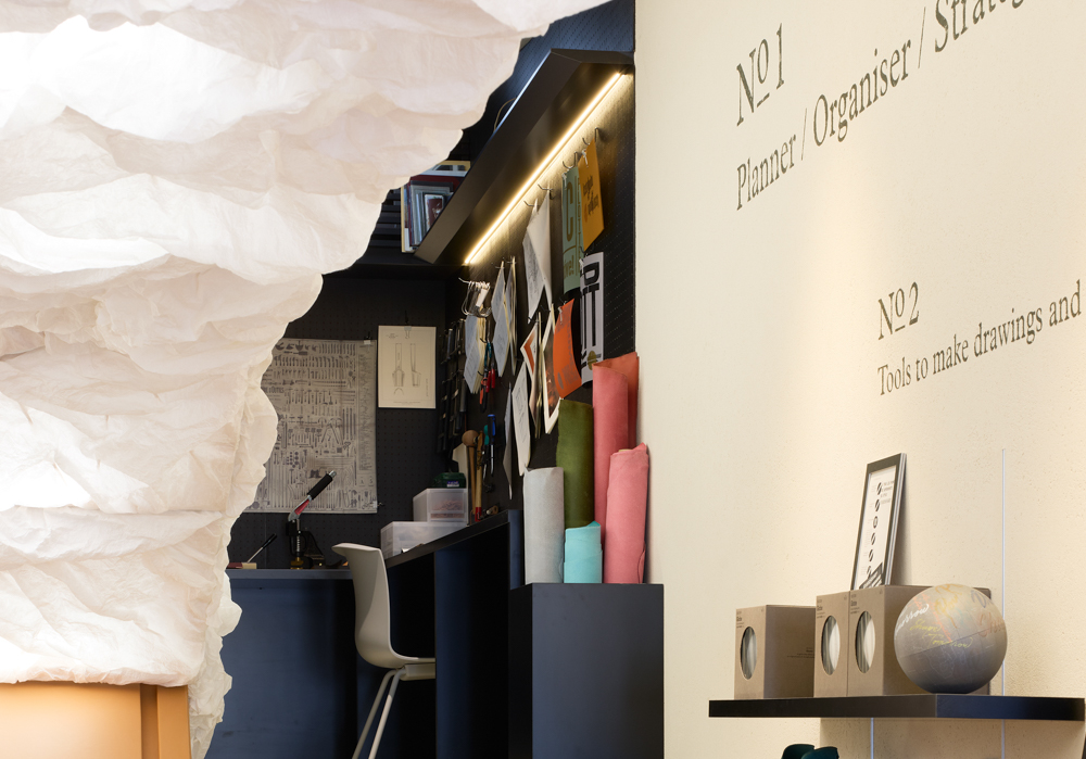 A light fixture featuring washi paper to resemble clouds and creativity.