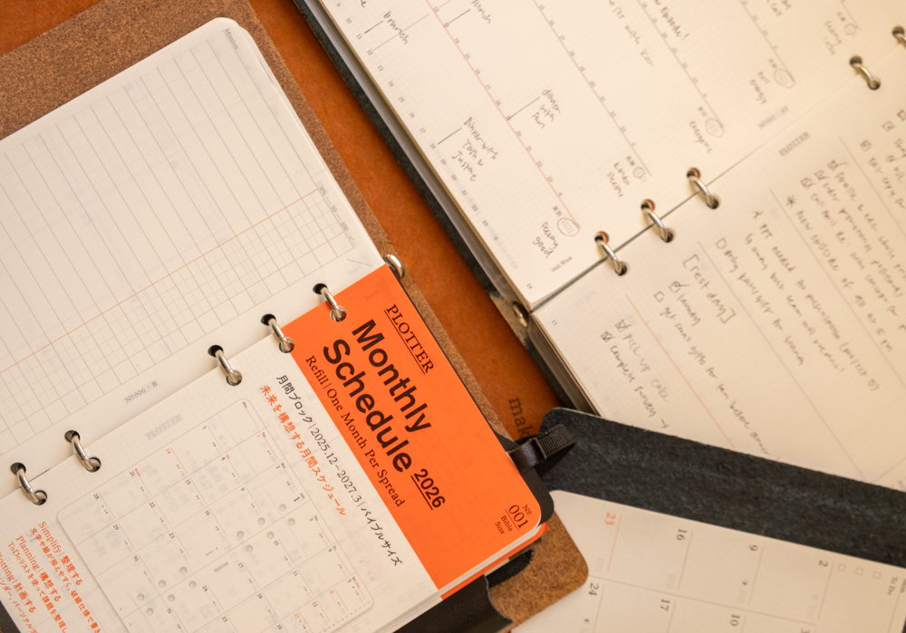 PLOTTER dated Diary 2026 refills in Monthly and Weekly Schedule formats inside PLOTTER Leather Binders in A5, Bible, and Mini Size.