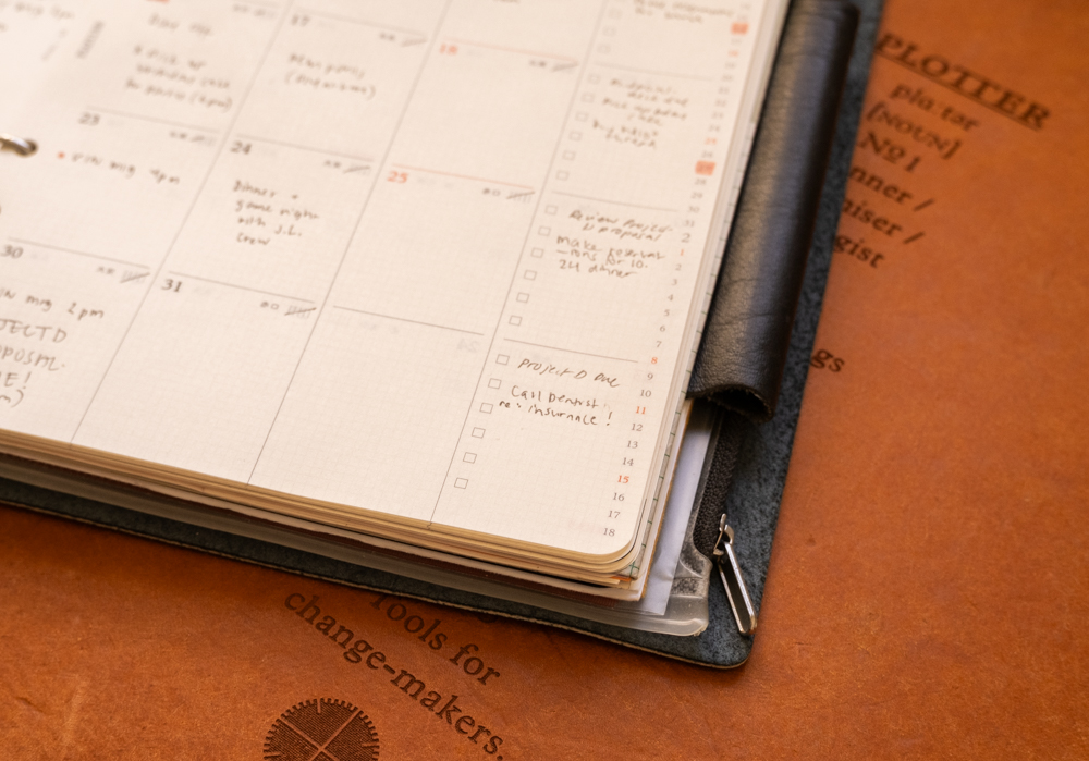 Bottom right corner of the PLOTTER Diary 2026 Monthly Schedule refill, filled in with a person's plans, to-do lists, tasks, and appointments.