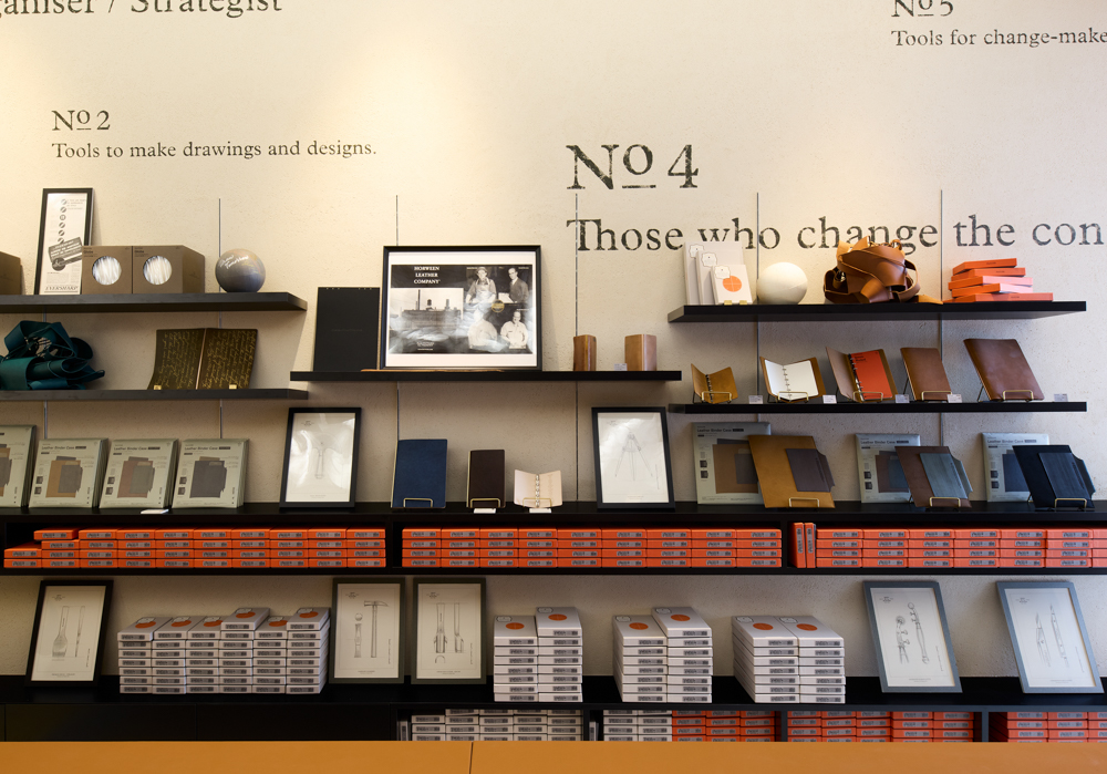 Inside of PLOTTER TOKYO flagship store with shelves filled with PLOTTER products.