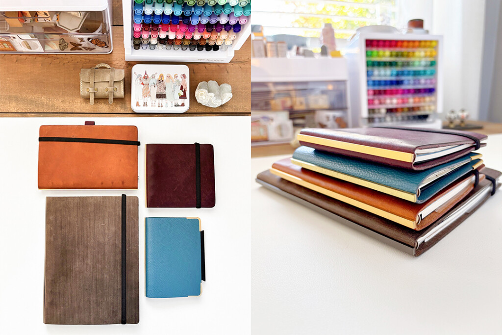 Four PLOTTER Leather Binders of various colors and textures are displayed on a white surface, with art supplies and colorful markers in the background, conveying creativity and organization.
