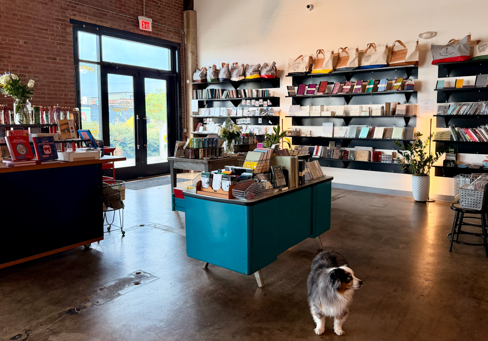 Interior of Good Postage shop in Charlotte, North Carolina, which is filled with stationery, paper goods, and writing instruments.
