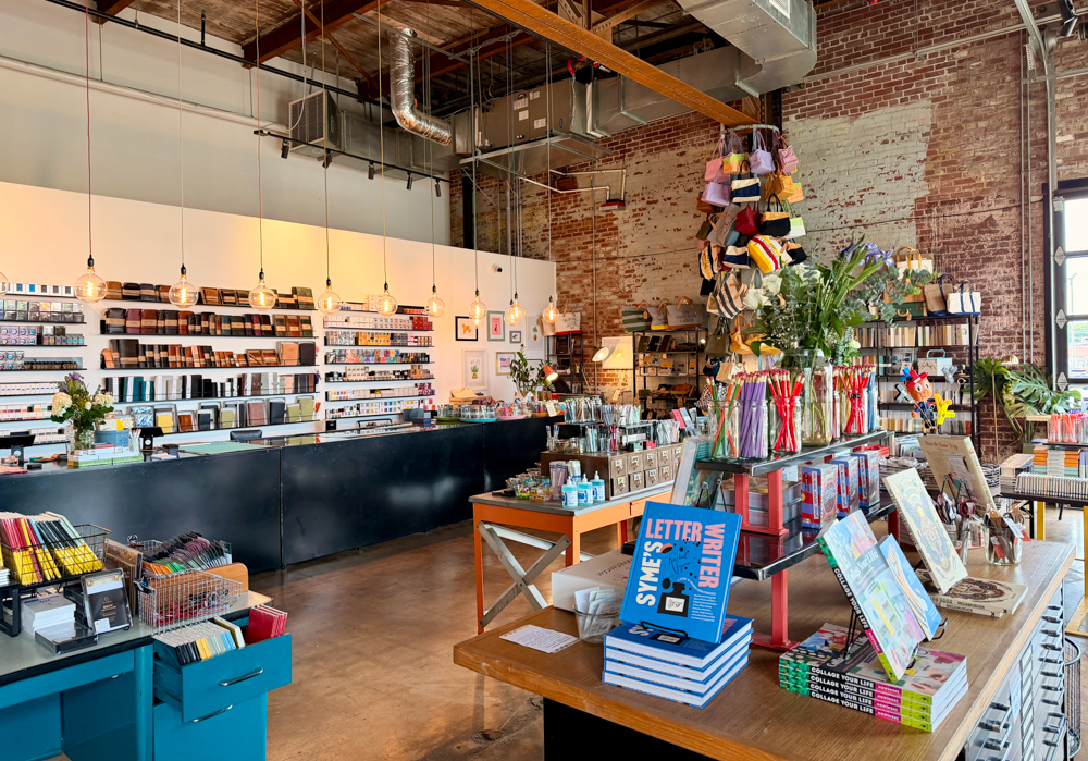 Interior of Good Postage shop in Charlotte, North Carolina, which is filled with stationery, paper goods, and writing instruments.