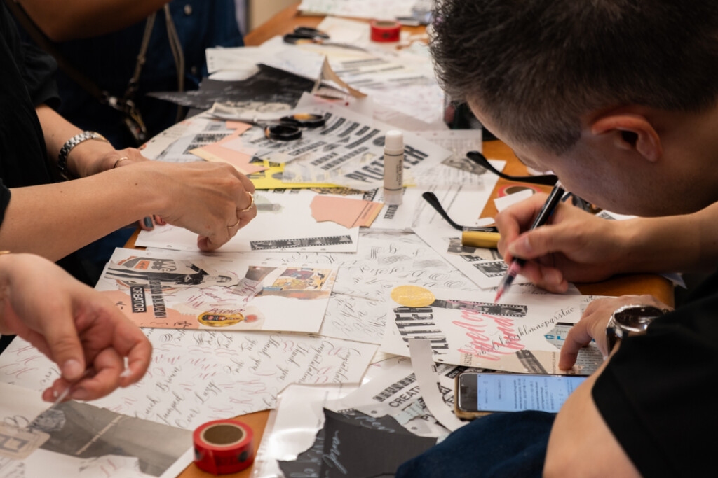 Takayuki Saito, the director of PLOTTER, is collaging and doing calligraphy during the PLOTTER TOKYO workshop, which takes place on the third floor of PLOTTER TOKYO.