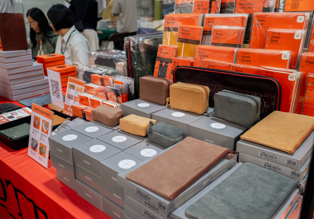 The gusset pouches and flat pen cases displayed on the PLOTTER USA table at Stationery Fest 2026.