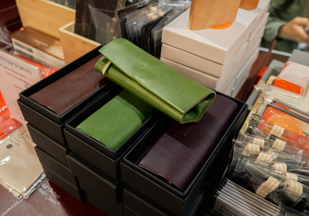 The Liscio leather pen rolls on the PLOTTER USA table at Stationery Fest 2026.