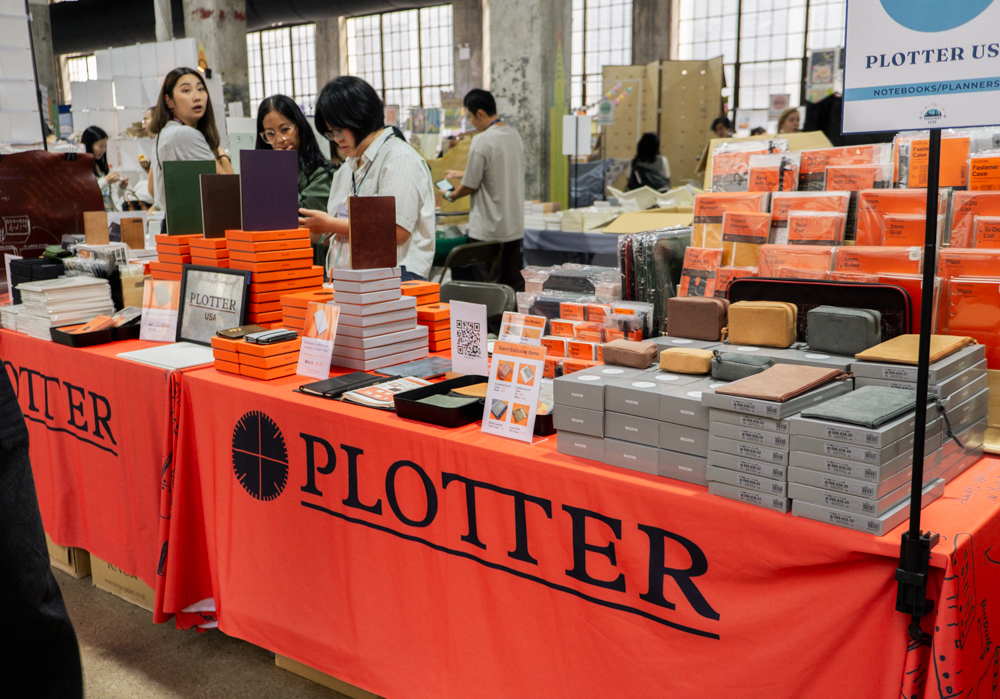 A view of the whole PLOTTER USA table at Stationery Fest 2026.