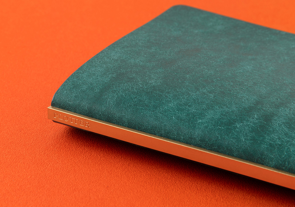 A teal blue color that develops a shiny luster over use.